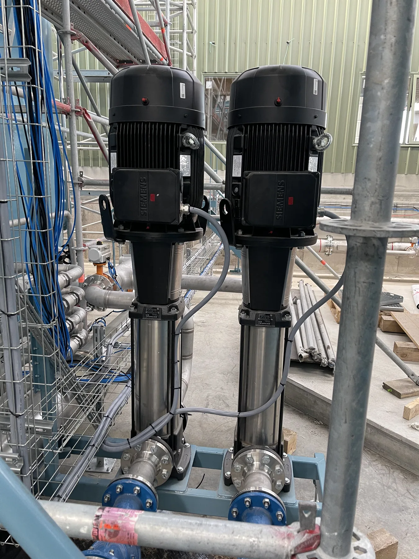 Twin pumps and associated pipework at the Kiwi Lumber treatment plant